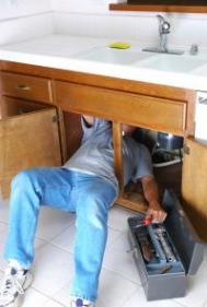one of our San Carlos plumbers is fixing a garbage disposal