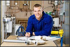 one of our San Carlos plumbers is posing at the office